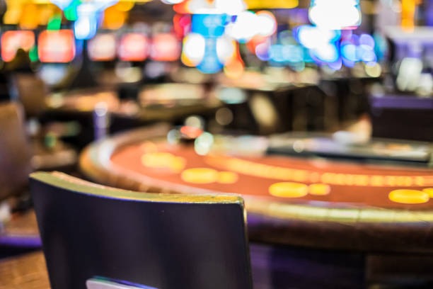 Live casino dealer at blackjack table on bos5000 slot
